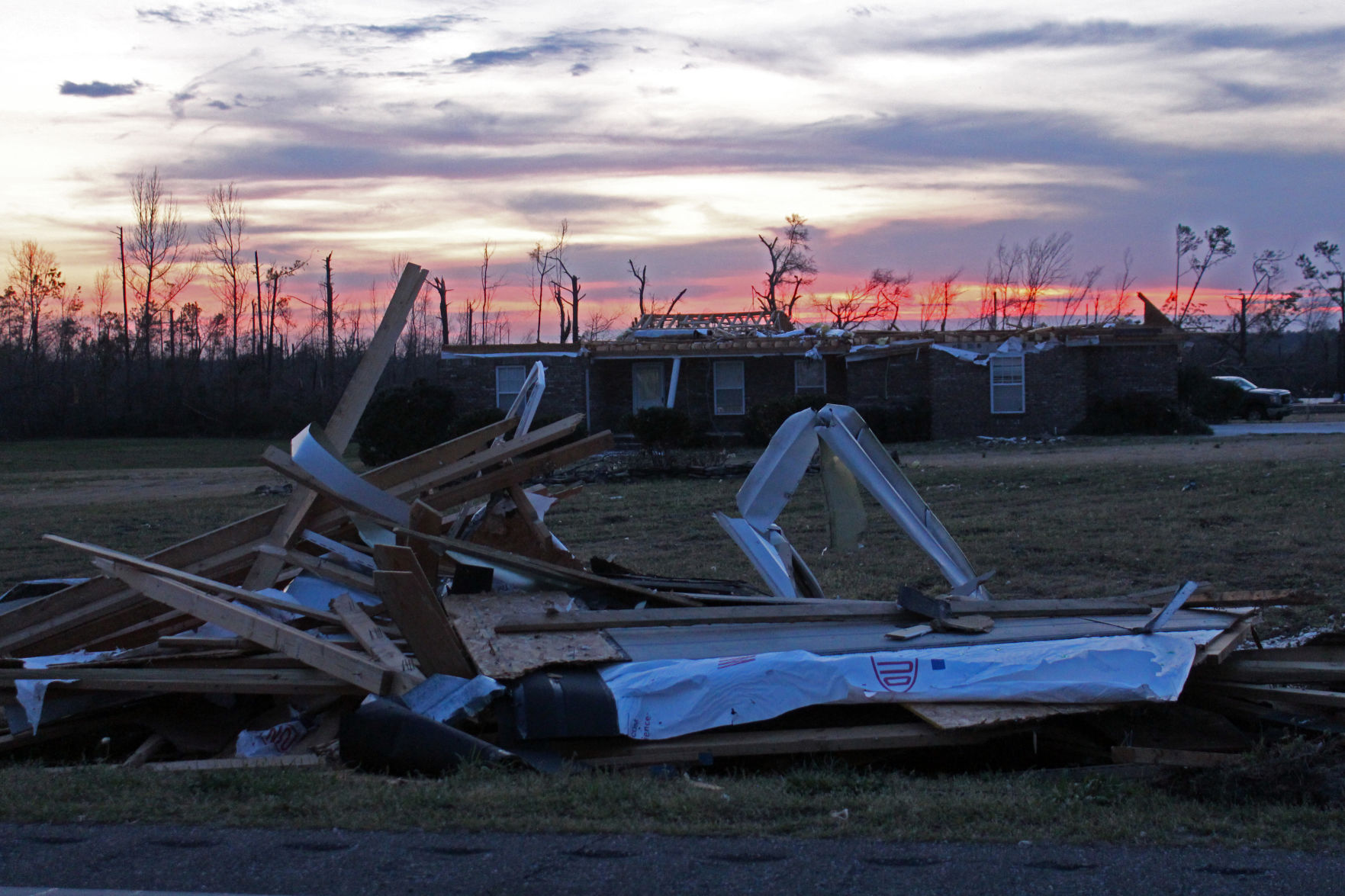 Sun sets over damage in Beauregard on Saturday evening
